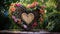 A wooden heart planter overflowing with cascading vines and