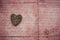 Wooden heart on rustic background