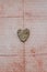 Wooden heart on rustic background