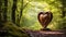 A wooden heart sculpture standing alone in a tranquil forest clearing,