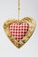 Wooden heart and squared textile
