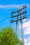 Wooden high-voltage power lines support. blue sky with clouds. Electrical industry. Russia. Siberia. Power station.