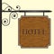 Wooden hotel door sign