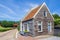 Wooden house at a cobblestoned street in Bourtange