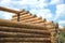 Wooden house construction from logs side view closeup