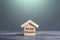 Wooden house figurine with inscription Mortgage forbearance. Borrower and lender agreements reduce or suspend mortgage loan