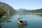 Wooden house floating on Drina river