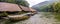 Wooden house floating on the river