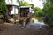 Wooden house flooded, old rural house in water