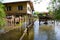 Wooden house flooded, old rural house in water