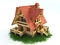 Wooden house on grass 3d illustration