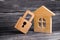 Wooden house with a padlock. House with a lock. Security and safety, collateral, loan for a mortgage. Confiscation of property