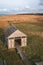 A wooden house and picnic place in the Randu meadows in Latvia. Natural preserve by the Baltic sea