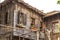 Wooden house with retro windows and shutters in Bulgaria