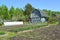 Wooden house on the seasonal dacha in the spring afternoon