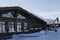 Wooden house for skiers and snowboarders, winter snow mountains