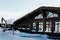 Wooden house for skiers and snowboarders, winter snow mountains