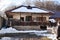 Wooden house in winter landsape