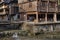 Wooden houses and cobblestone embankment rural river in Chinese