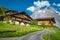 Wooden houses and flowery gardens with picturesque view, Grindelwald, Switzerland
