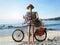 Wooden Human Backpacker With Retro Bicycle on Beach Background,