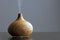wooden humidifier for essential oils, with steam smoke, gray background