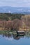 A wooden hut on a lake