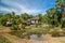 Wooden hut on stilts in rural cambodian landscape