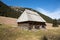 Wooden huts in Chocholowska valley in spring, Tatra Mountains,