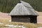 Wooden huts in Chocholowska valley in spring, Tatra Mountains, Poland