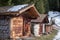 Wooden huts in the Lauterbrunnen Valley, Switzerland,  above the village of Wengen in the Swiss Alps.