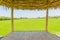 The wooden huts in a rice green in the field a vast area