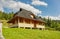 Wooden Hutsul-style house in Dzembronya village in Ukrainian Carpathians