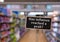 Wooden information label sign with text HAS INFLATION REACHED A PEAK against defocused store shelves message. Global