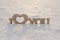 Wooden inscription I love you with a heart stands in a snowdrift. Horizontal photo, romance concept