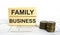 Wooden jenga with text Family Business. Finance conzept