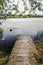 Wooden jetty in an artificial lagoon in Galicia Spain