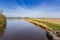 Wooden jetty at the canal outside Winschoten