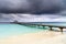 Wooden jetty over the beautiful Maldivian ocean