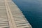 Wooden jetty over rippling water