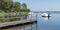 Wooden jetty at sunset in Lacanau lake Gironde France in web banner template