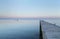 Wooden jetty in tranquil seashore at Brondbystrand, Denmark