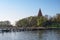 Wooden jetty in the yacht port at the church in a bay on the island Poel near Wismar in the Baltic Sea, Germany, blue sky with