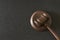 Wooden judge gavel on a black background. Copy space for text. Legal action