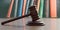 Wooden judge gavel on different law book background. Lawyer office. Auction or judgment. 3d render