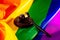 Wooden judge mallet on lgbt rainbow flag