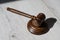 Wooden judicial gavel on a wooden laminate.