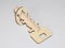 Wooden key for the development of logic. Puzzle for children