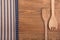 Wooden kitchen utensils and linen kitchen towels