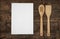 Wooden kitchenware and blank paper sheets for recipes